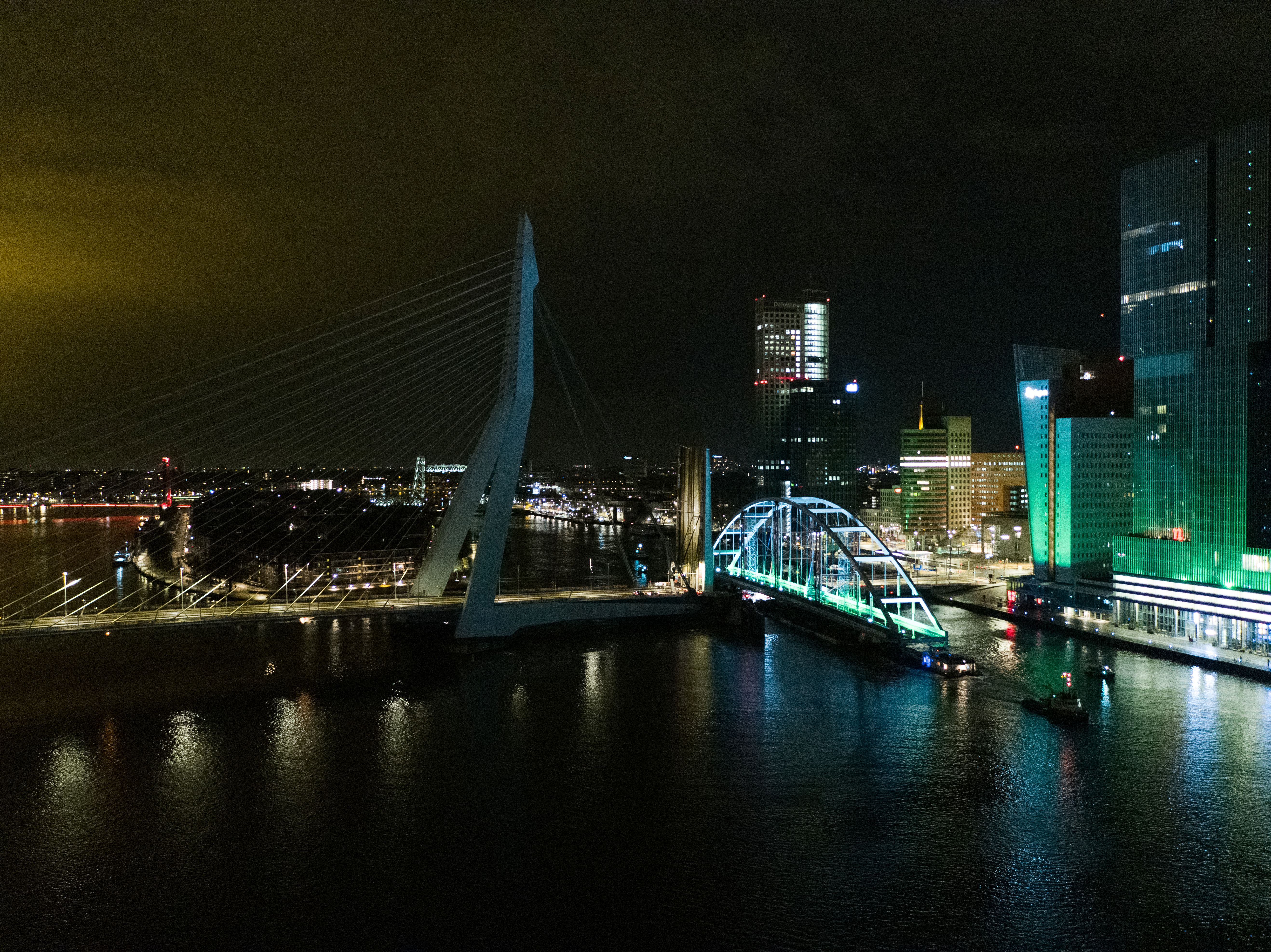 The transport passing the Erasmus Bridge